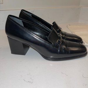 Gucci patent leather black loafers with heel